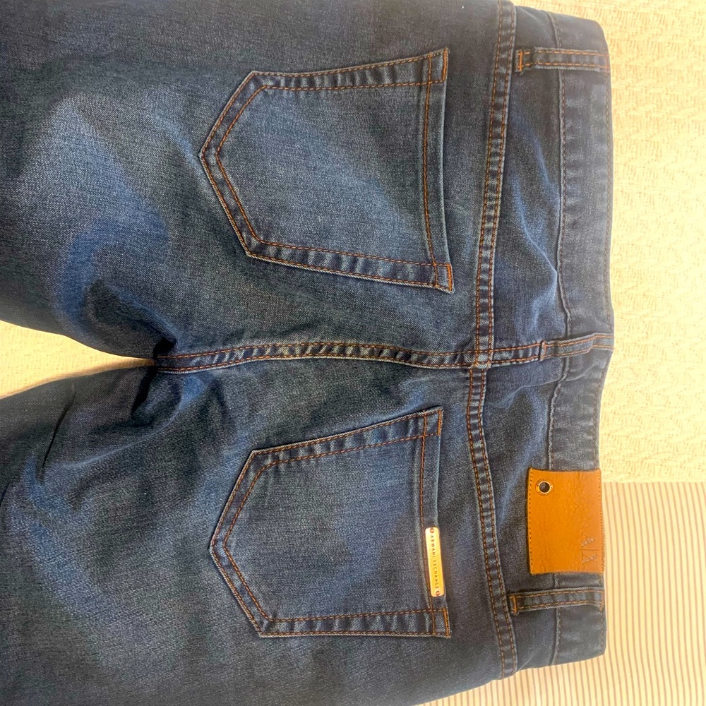 Armani Exchange skinny jeans.